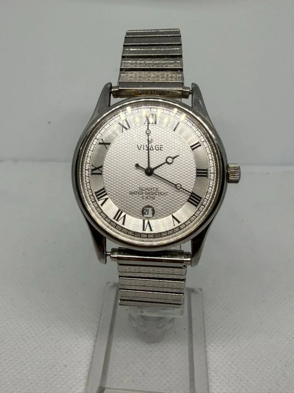 Visage Quartz Wristwatch Silver Dial Textured Center Roman Numerals 13370